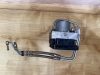 Tesla Model 3 ABS kocka 104474500B